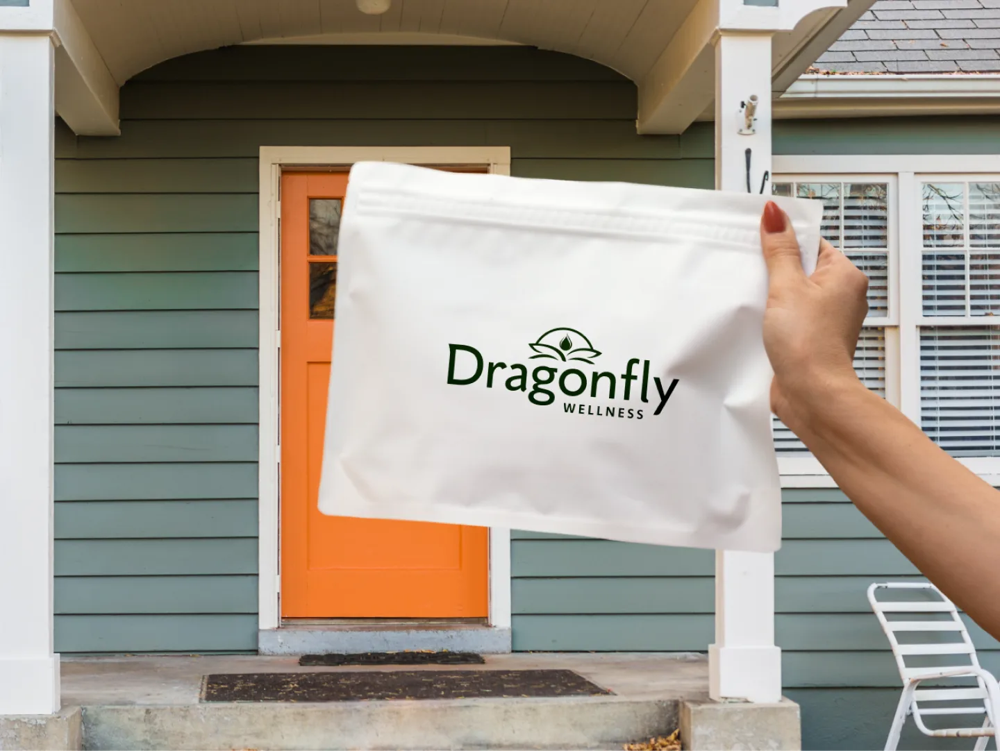 Dragonfly Wellness delivery bag handed off at a customer's front door
